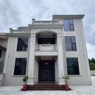 云南 芝麻白石材别墅干挂案例展示